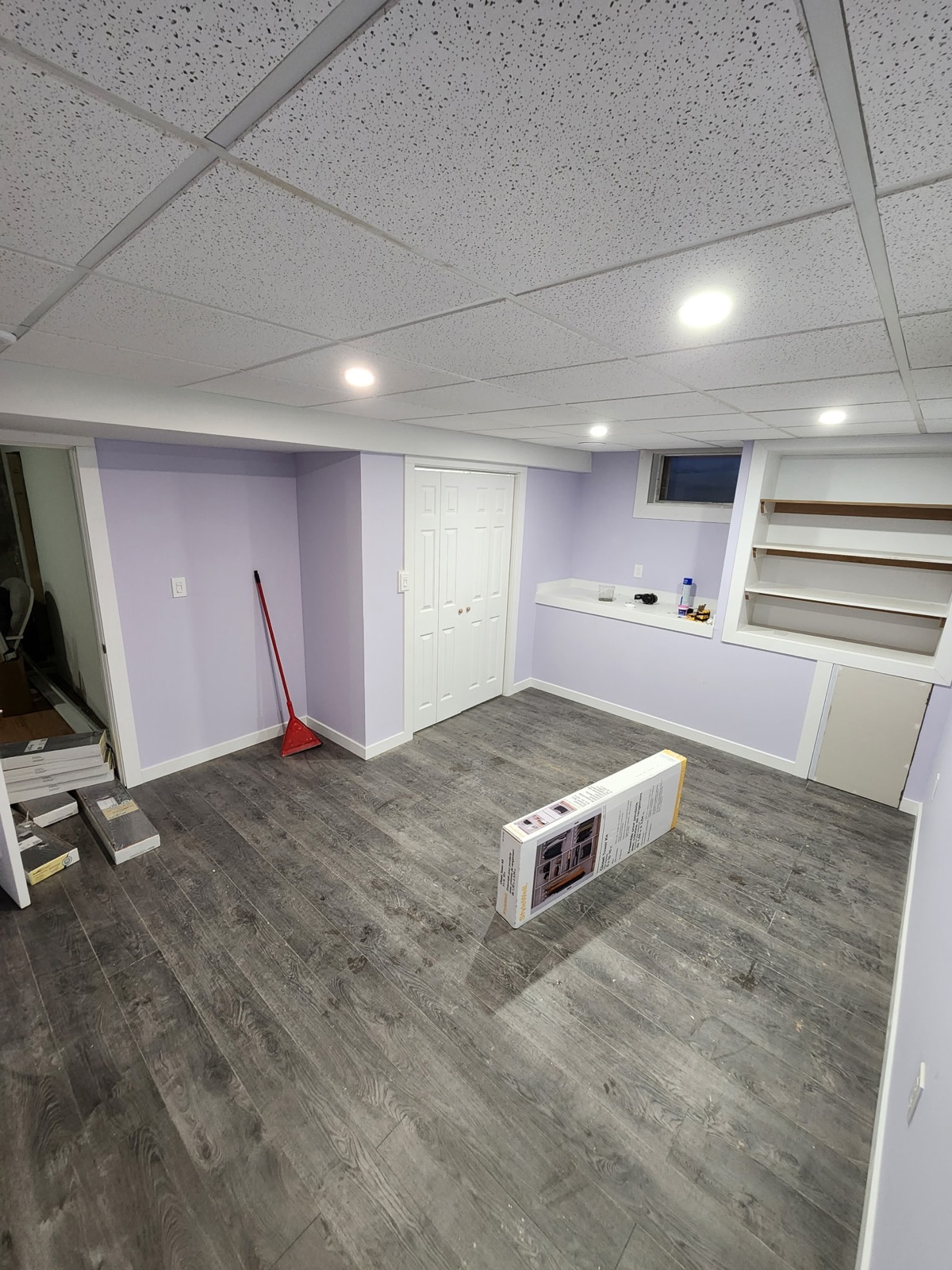 Finished basement flooring and interior update by Collins Contracting